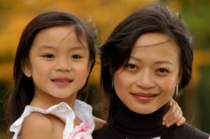 asian woman and child reduced in size